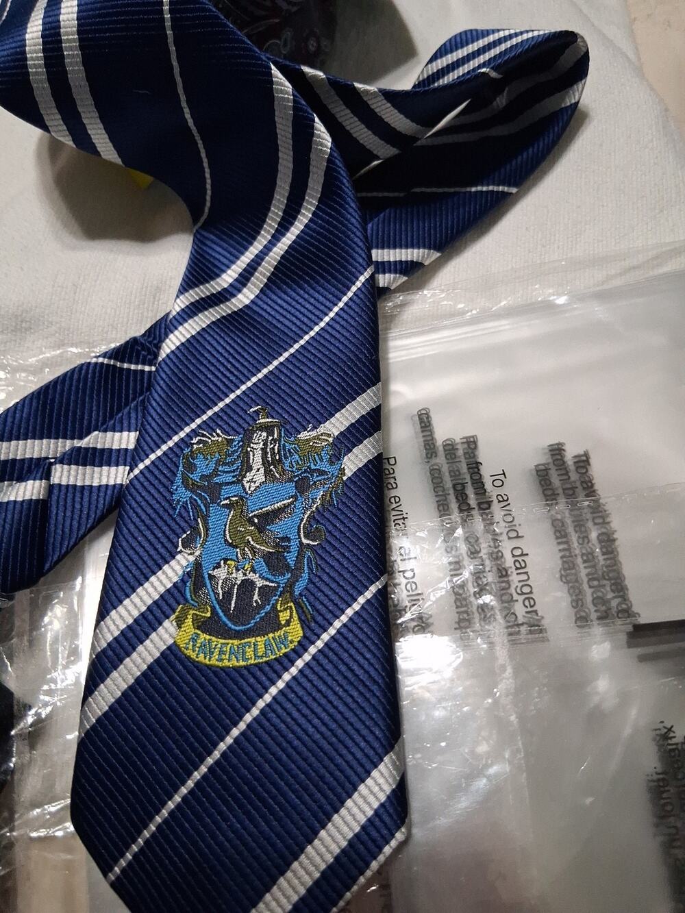 Harry Potter - Hogwarts Necktie with the Ravenclaw Logo, Blue & White Striped